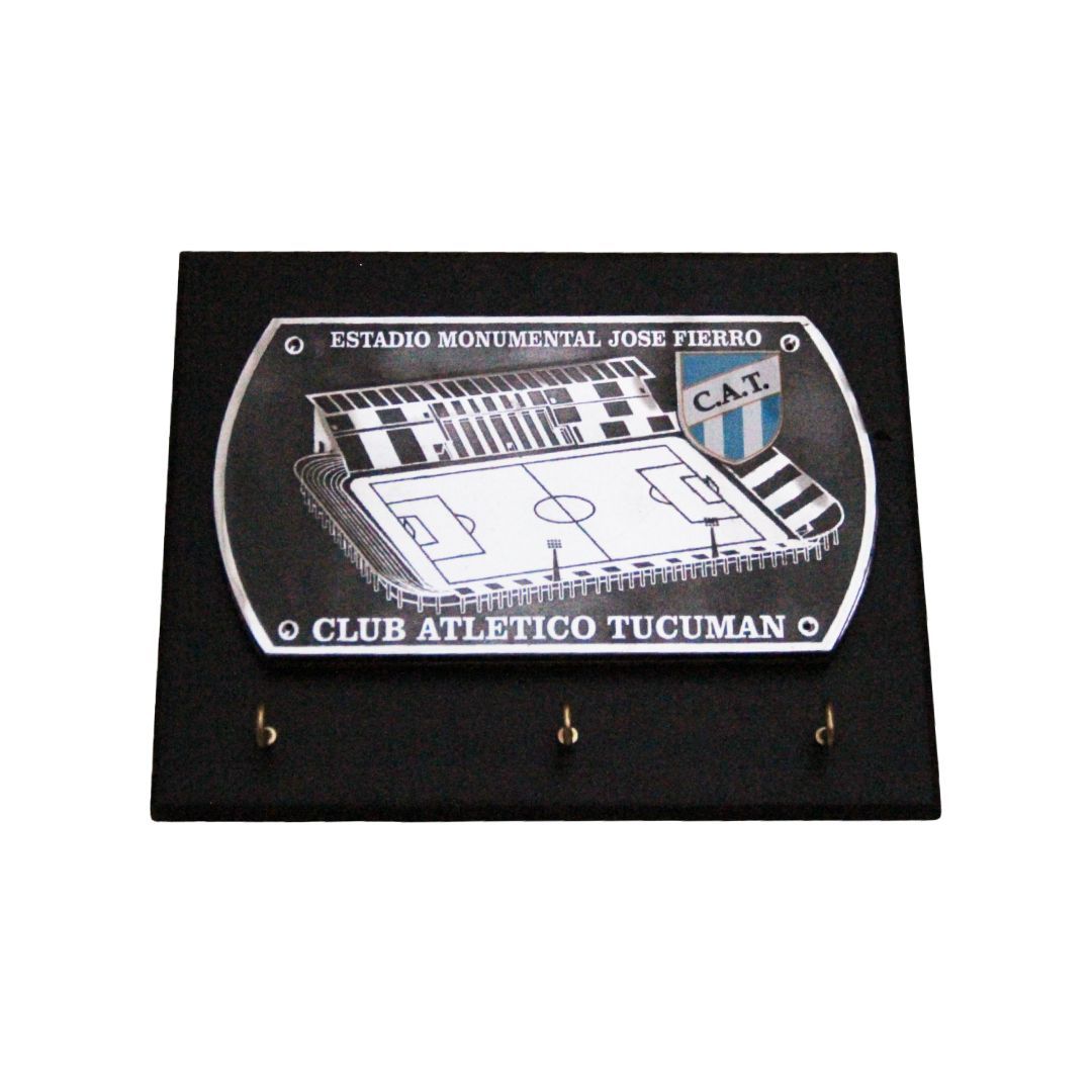 Black plaque with a silver emblem reading “La Ciudadela” and “Club Atlético San Martín”