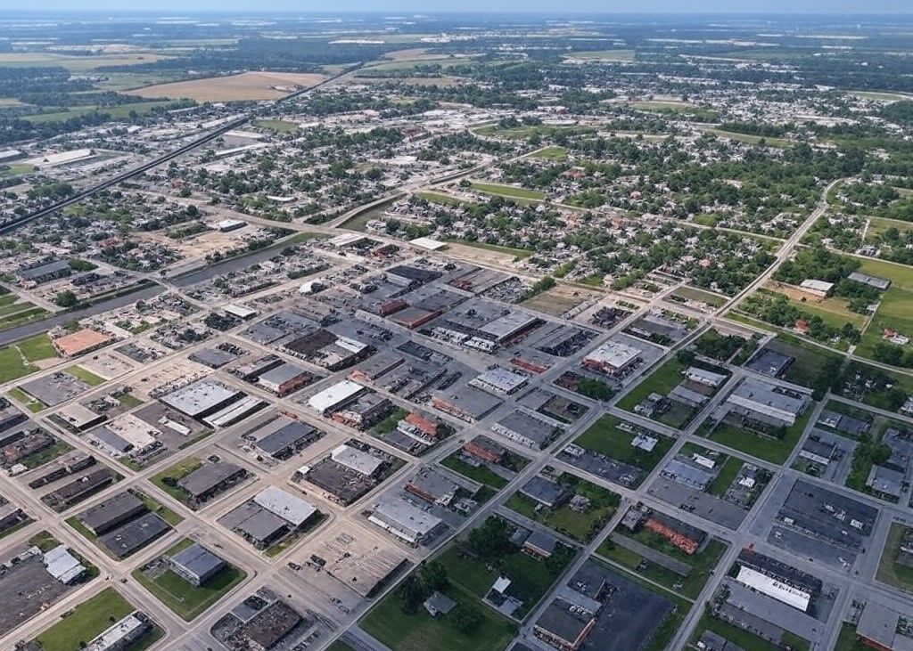 An aerial view of a small town with lots of buildings