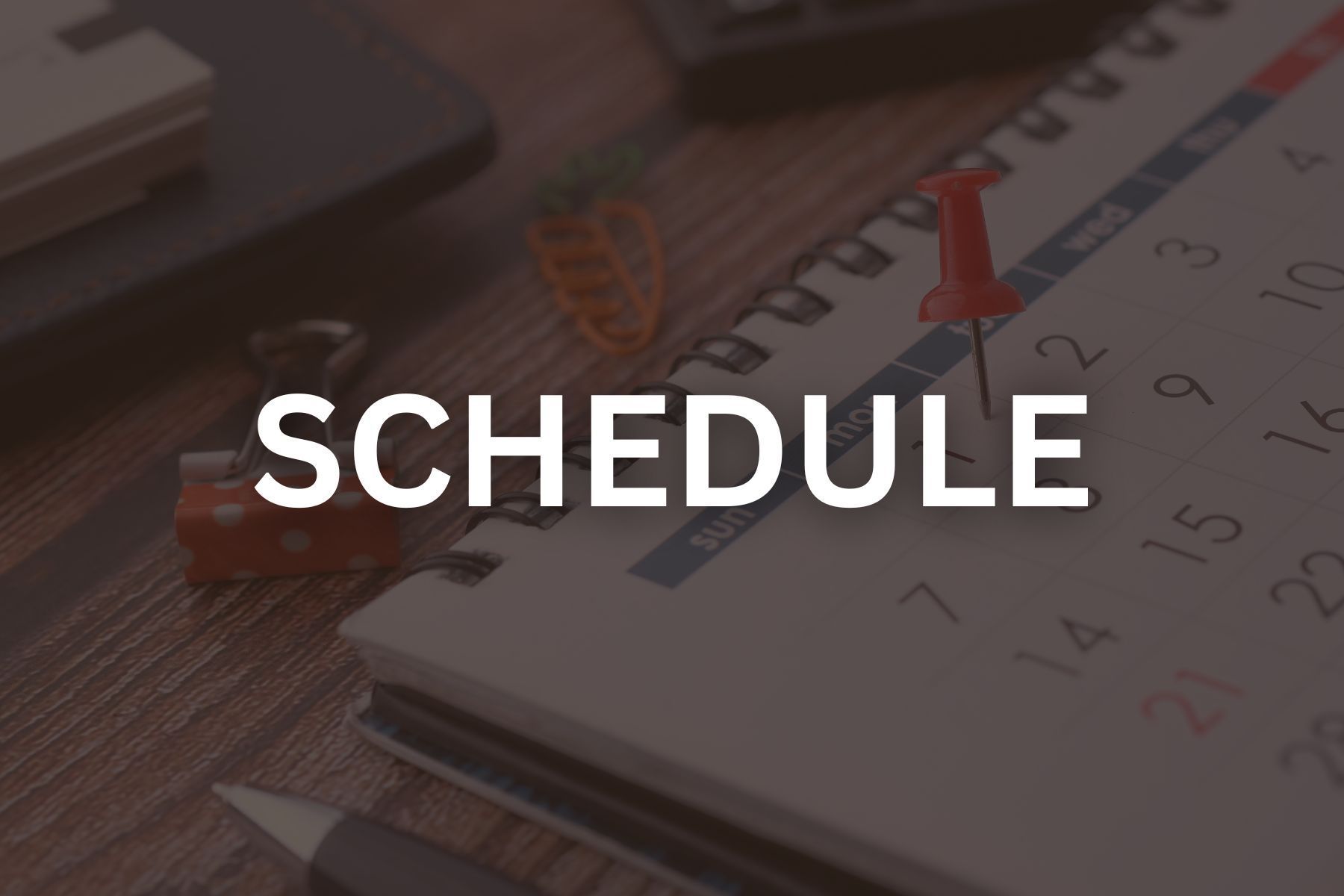 Calendar photo with black overlay that reads schedule