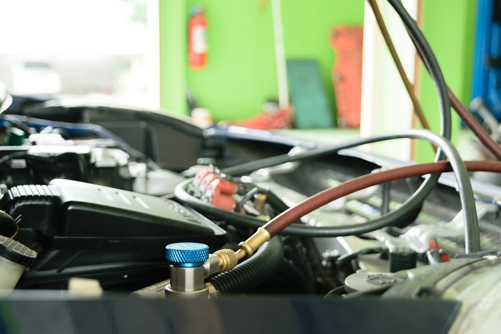 Car Engine Being Serviced with Hoses — Cartech Australia in Albury, NSW