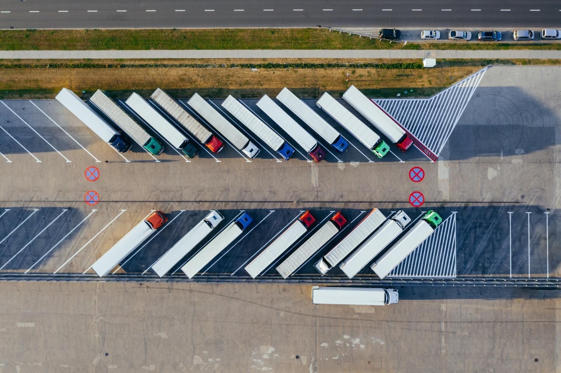 Overhead View of Parked Semi-Trucks in Rows at A Truck Stop — Cartech Australia in Lavington, NSW