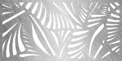 A close up of a metal surface with a white pattern on it.