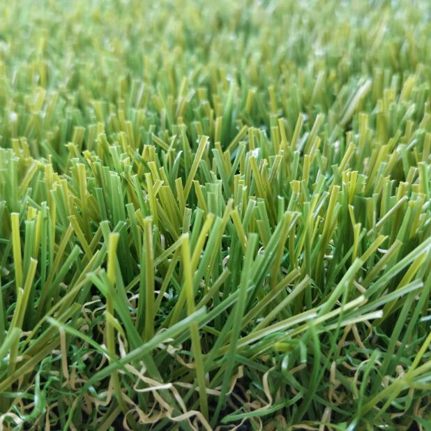 A close up of a piece of artificial grass.