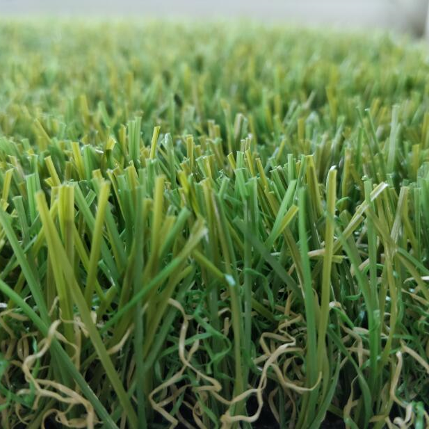A close up of a piece of artificial grass.