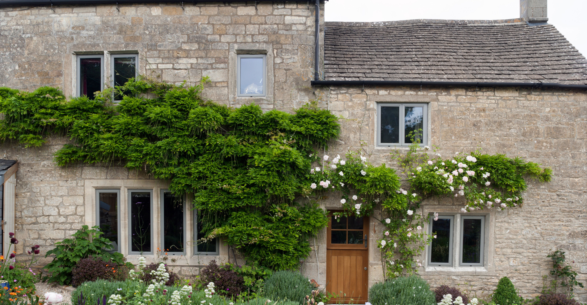 Casement windows - grey aluminium in Cotswold stone- Prior Products - Stratford upon Avon