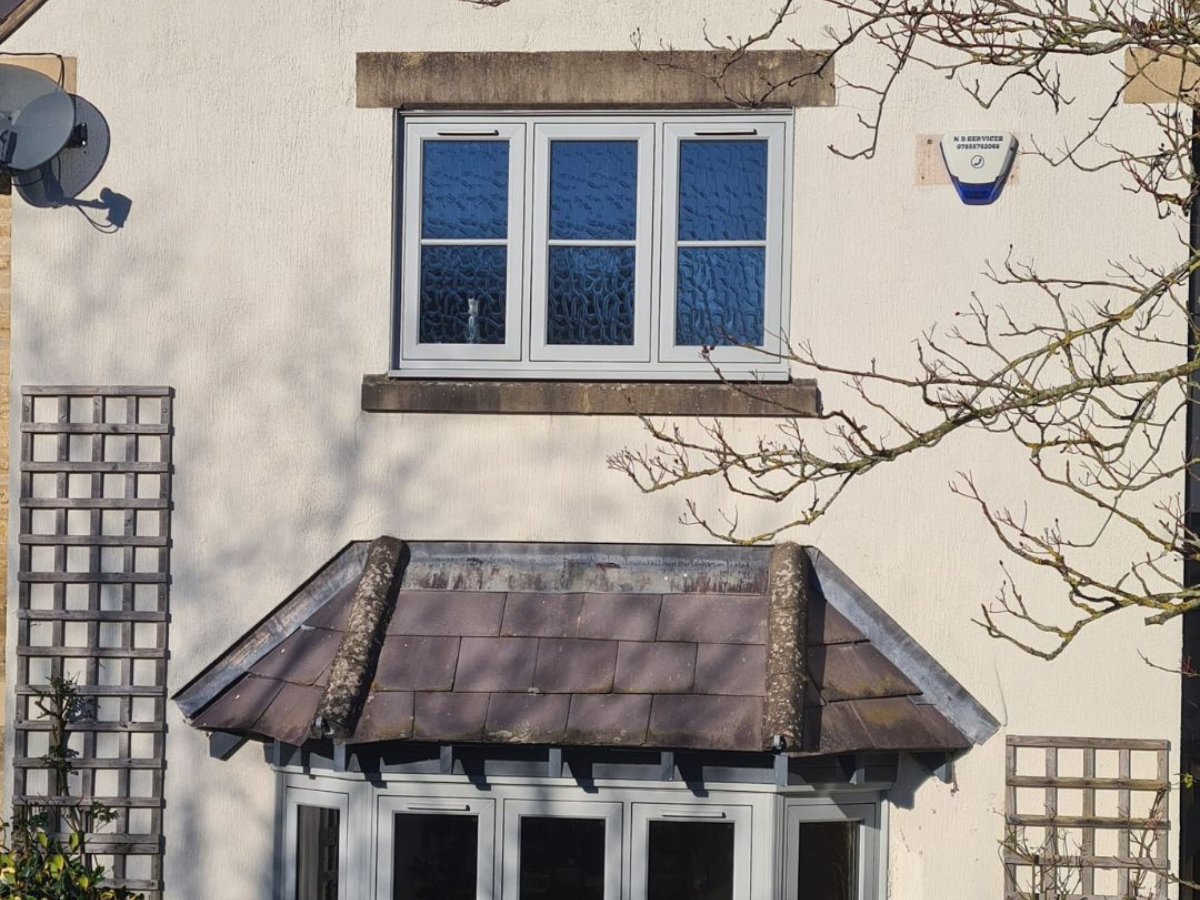 Flush casement windows on cream painted house by Prior Products  Stratford upon Avon