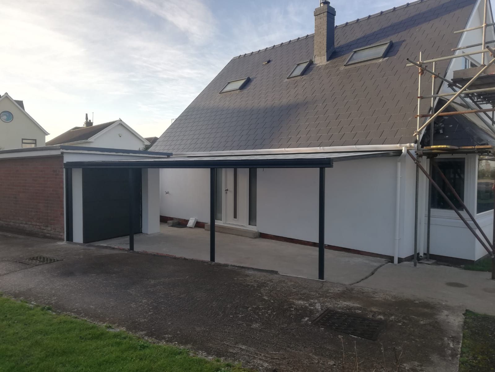 A house with a scaffolding in front of it