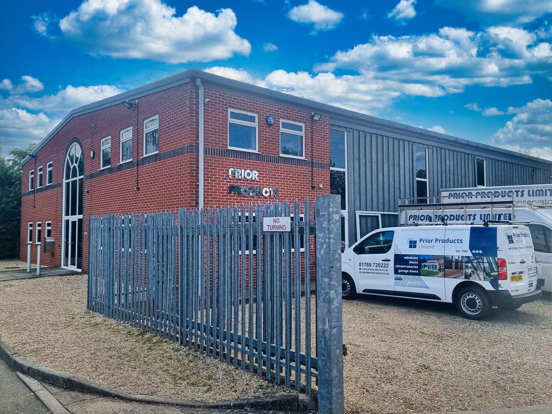 Prior Products Factory with a white service van parked outside under a blue sky.