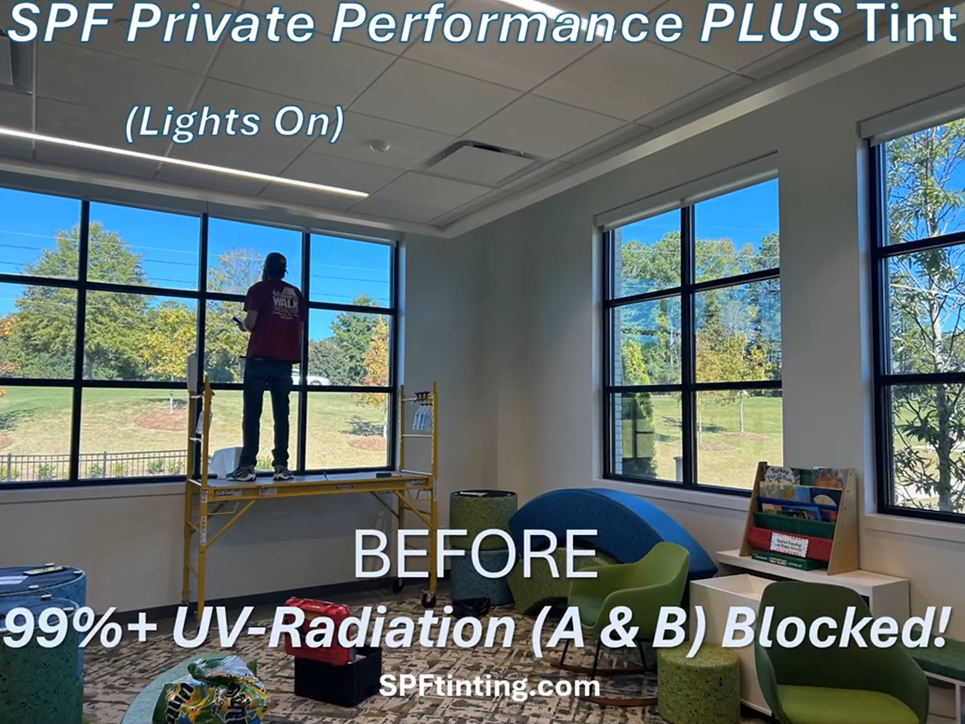 Window tint installer on ladder inside bright room; large windows show “BEFORE” and UV protection text.