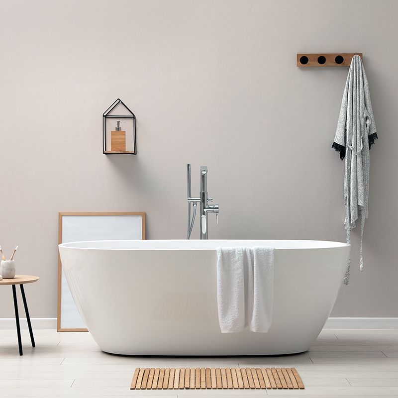 A bathroom with two sinks and two mirrors.