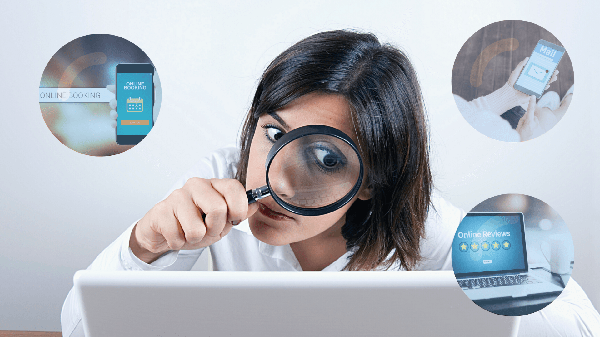 Doctor looking at laptop screen with magnifying glass