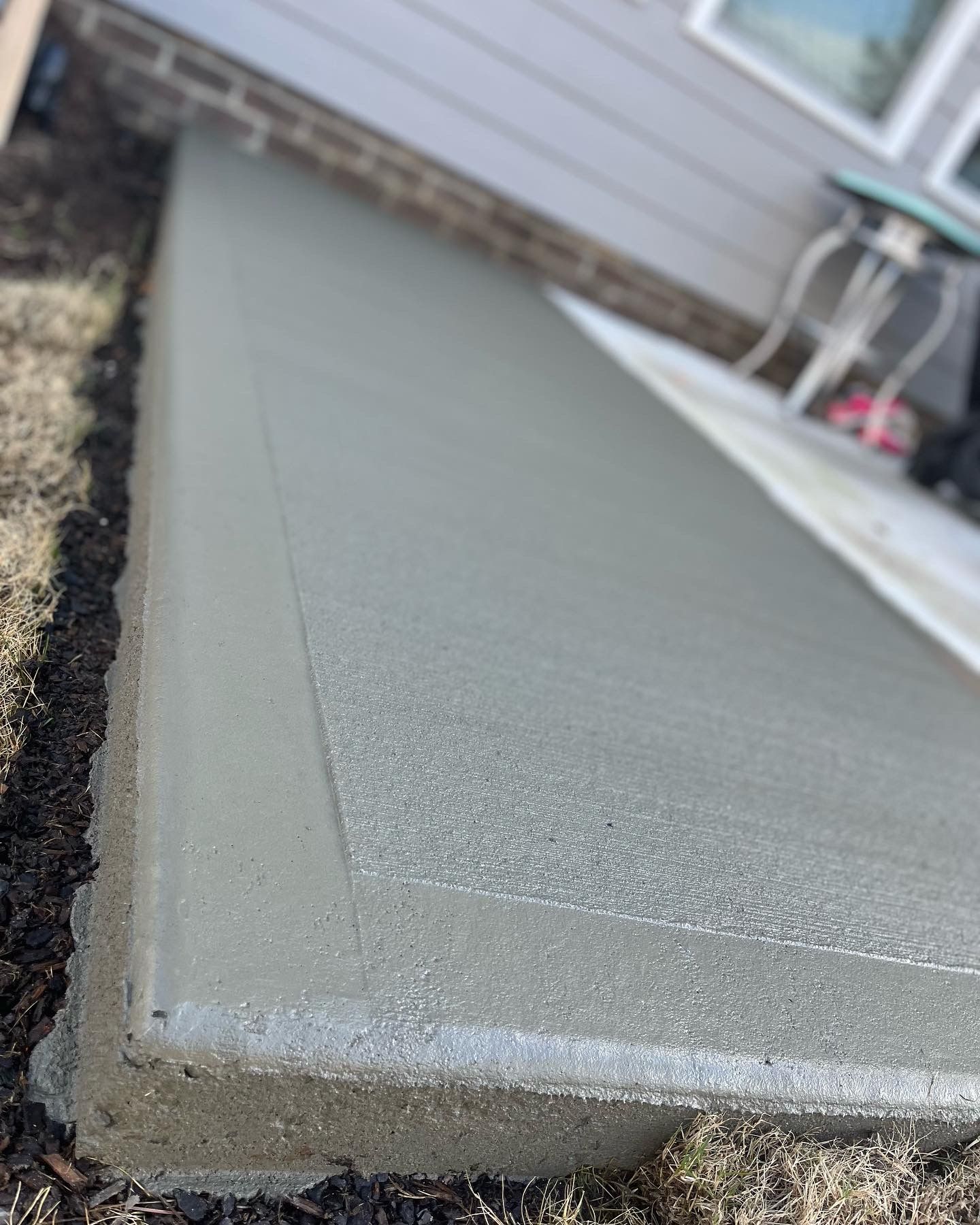 Freshly poured concrete patio 