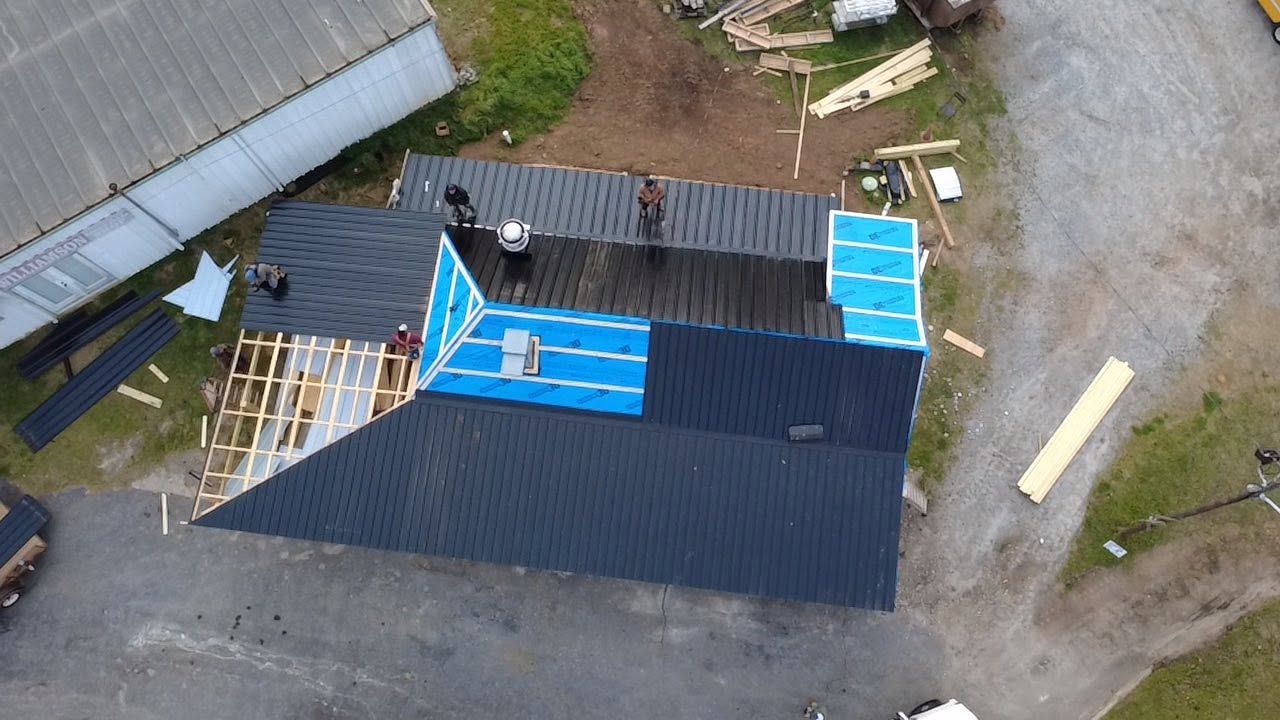 Commercial metal roofing installation by 4H Roofing in Central Georgia.