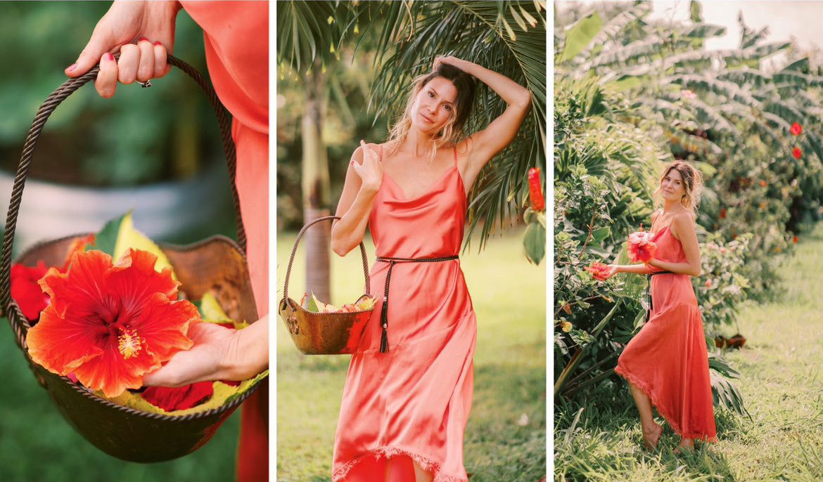 Dr. Bathurst picking hibiscus flowers on a farm in Hawaii