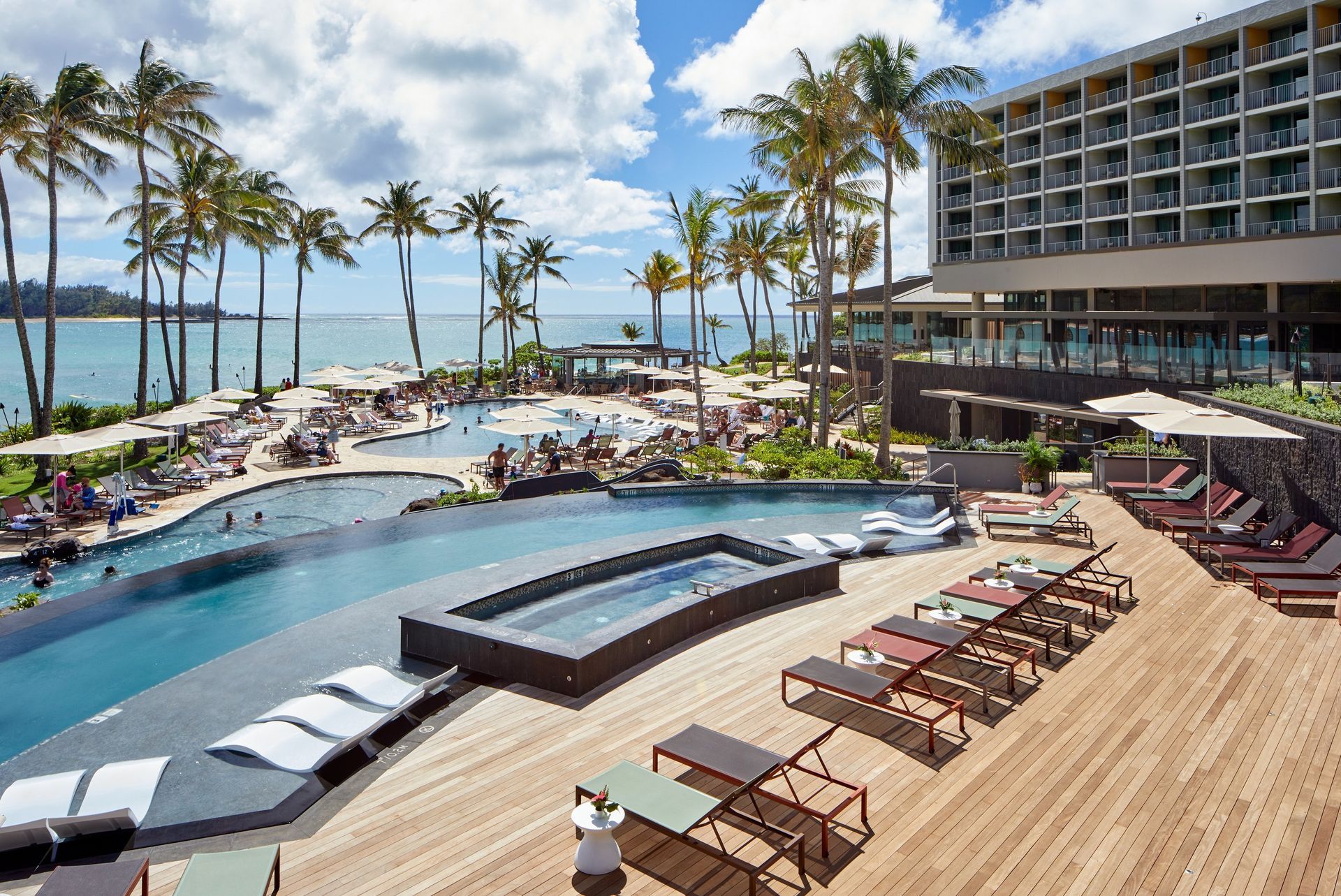 Pool and hot tub area facing the ocean at luxury resort Turtle Bay in Hawaii