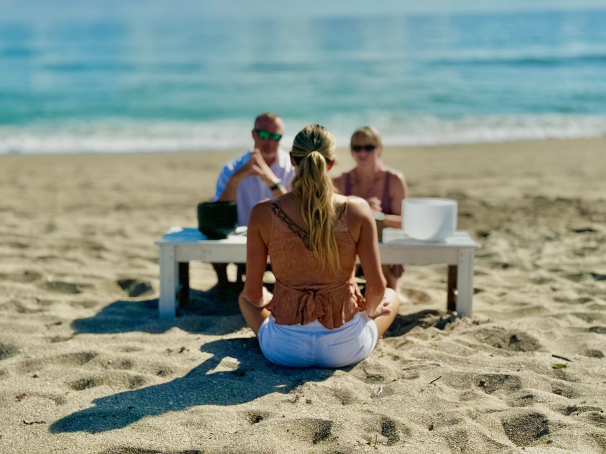 Sex coach and therapist Stephanie Bathurst conducts a workshop on the beach at our couple's sex therapy retreat in Florida. 
