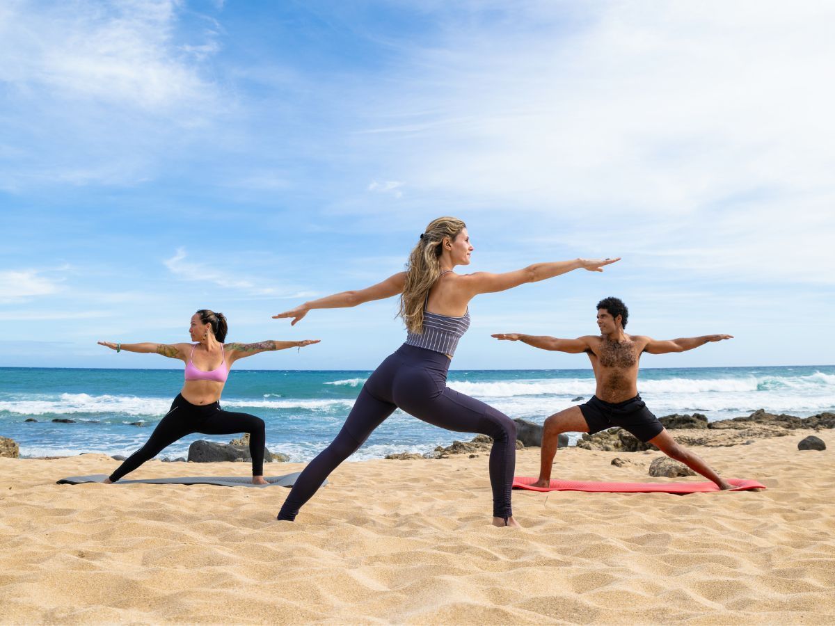 dr bathurst hosting yoga on the beach for a couples retreat