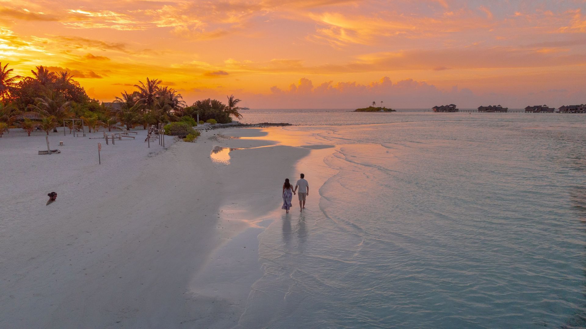 couples walking on beach together, rebuild a relationship after addiction