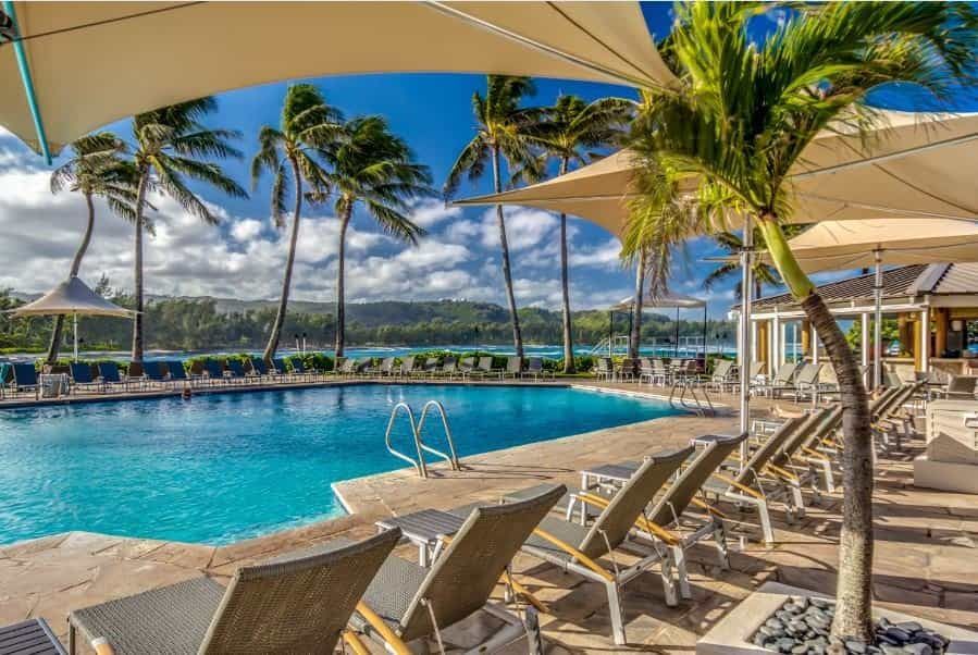 Pool cabanas facing the ocean at luxury resort Turtle Bay in Hawaii