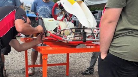 photo of a sck racing kart being straightened on a jig