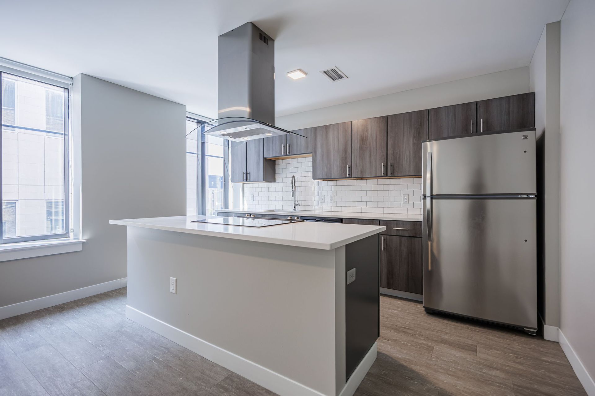 Kitchen with island and stainless steel appliances