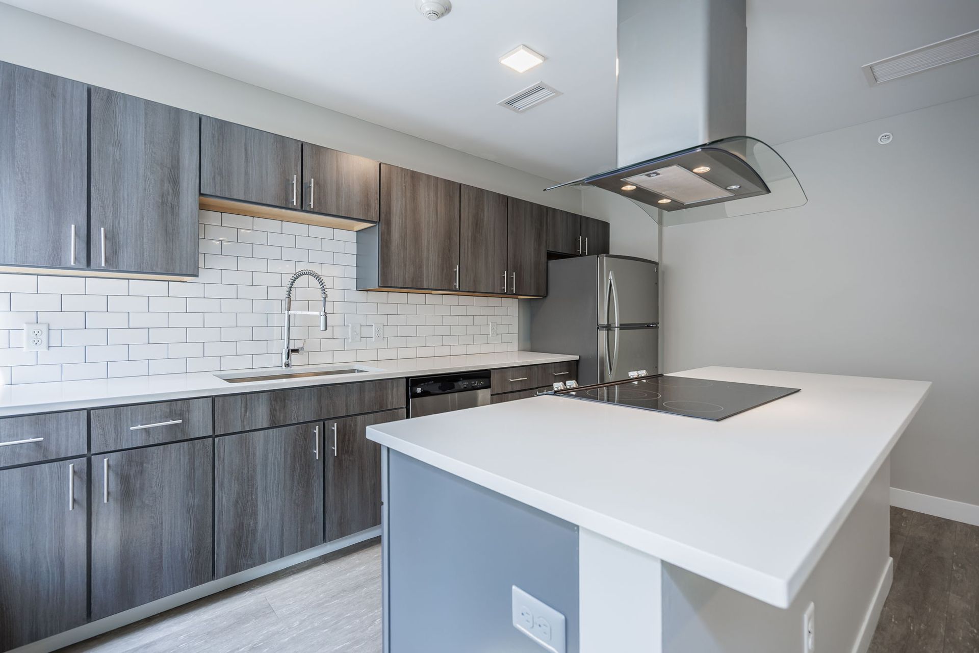 Kitchen with island and stainless steel appliances