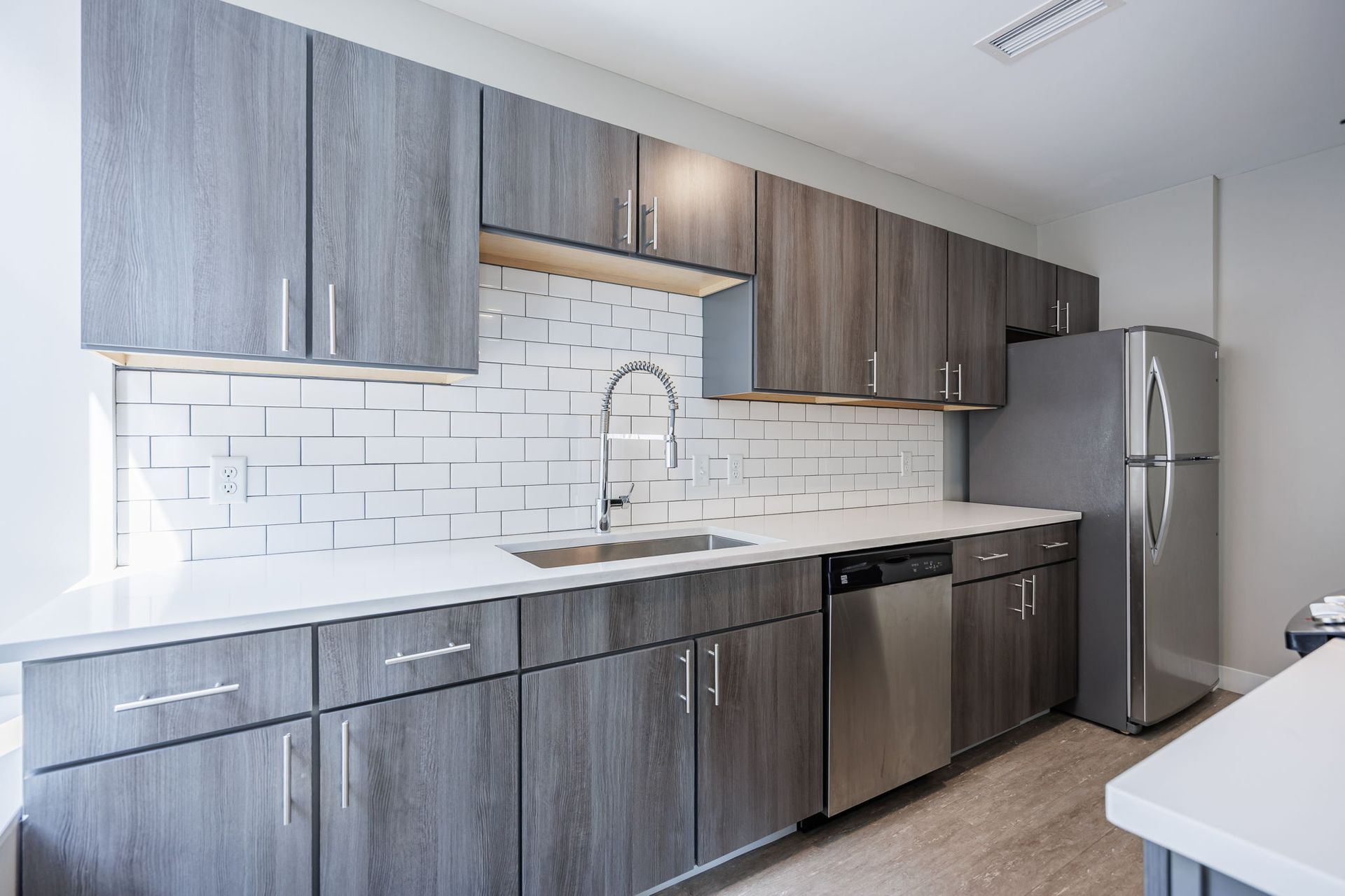 Kitchen with island and stainless steel appliances