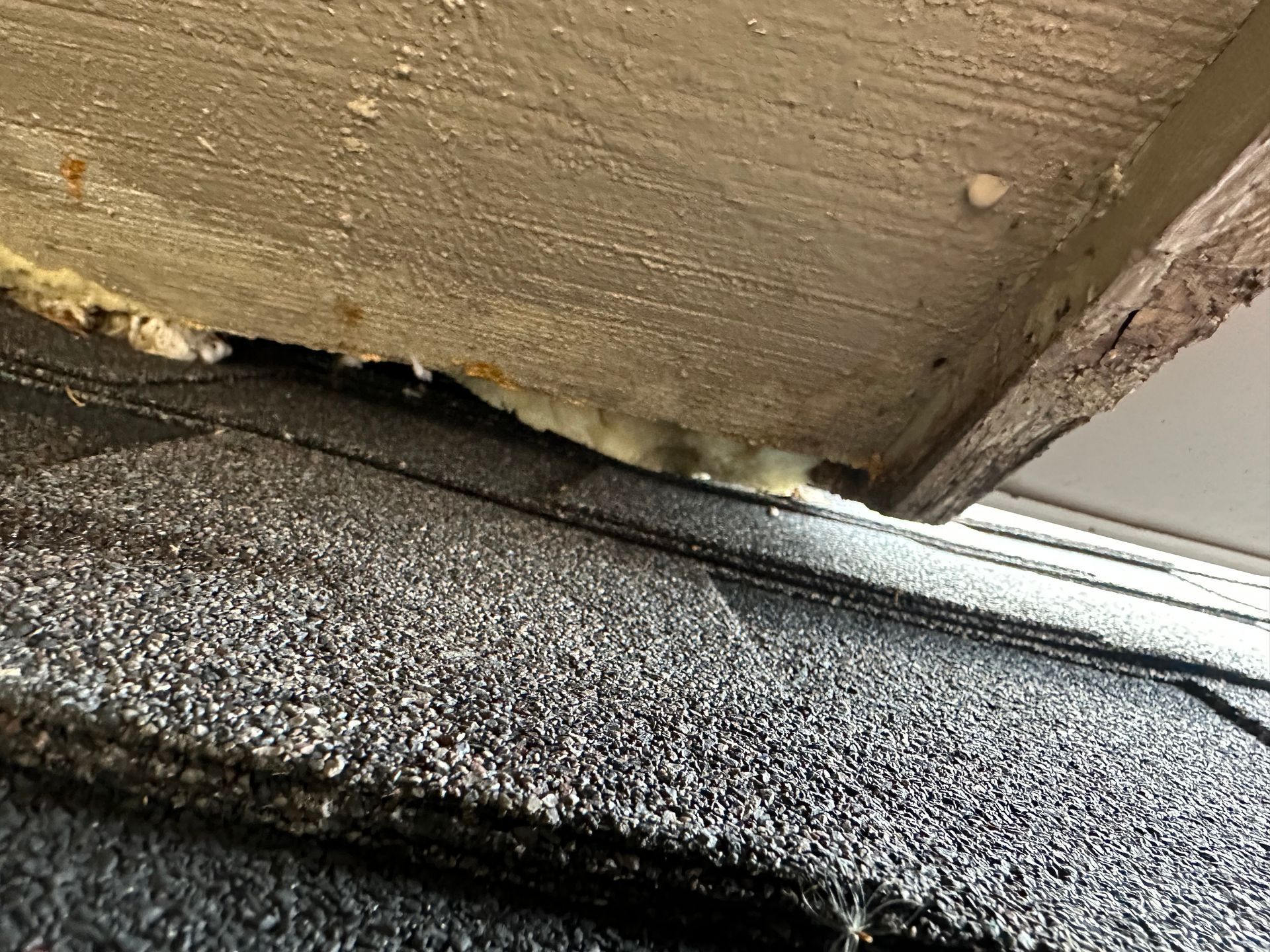 A close up of a roof with a hole in it.