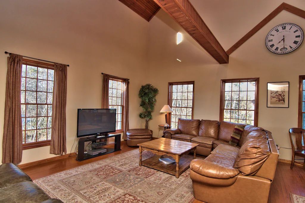 A living room with a couch and a television