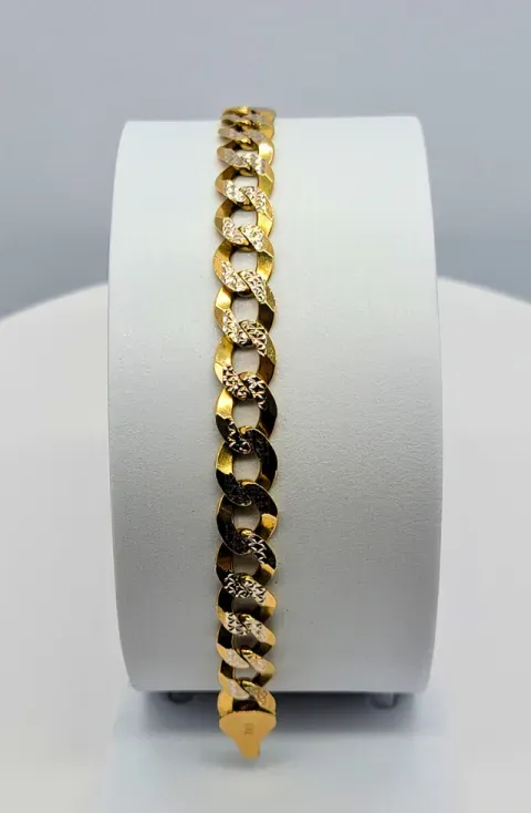 Gold and black chain bracelet displayed vertically on a white stand.