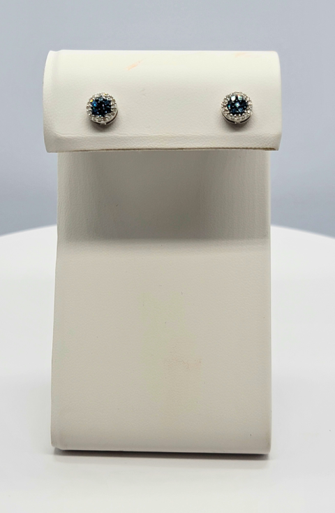 White box clutch purse with flap and two jeweled buttons, front view on a light background