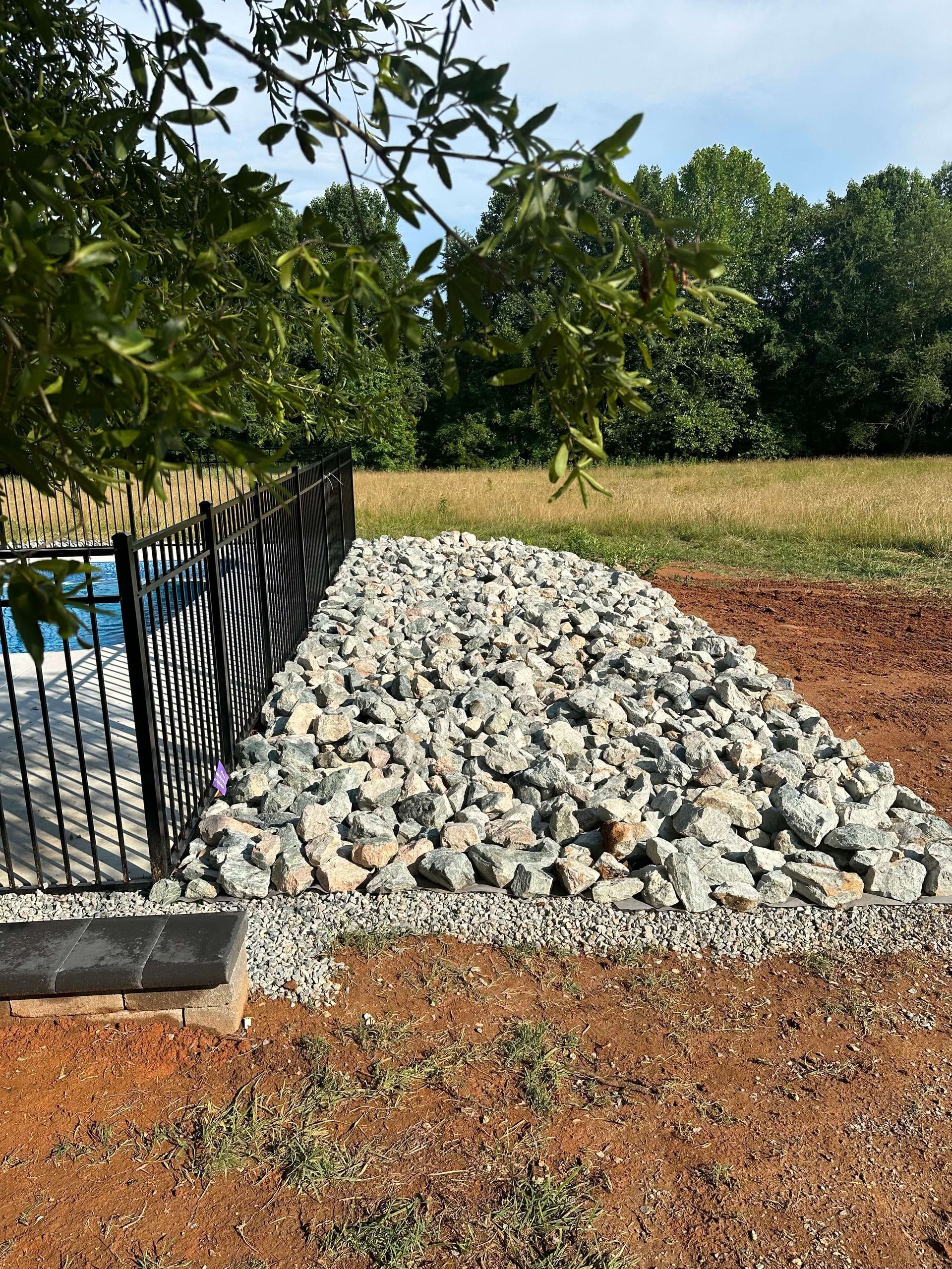 landscape, rock bedding, stone, landscape design, tree removal company, tree service, chesterfield va tree company