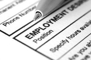 Pen resting on form that says employment