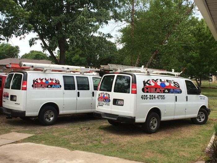 Two white vans with 