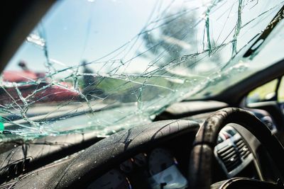 Shattered car windshield after an accident
