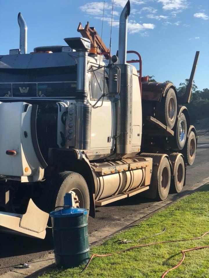 A Large Semi Truck Is Parked On The Side Of The Road — J & T Mobile Mechanics In Highworth, QLD