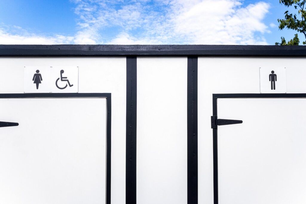 A Handicapped Toilet and a Man's Toilet Are Next to Each Other — A1 Maintenance and Building In Old Bar, NSW