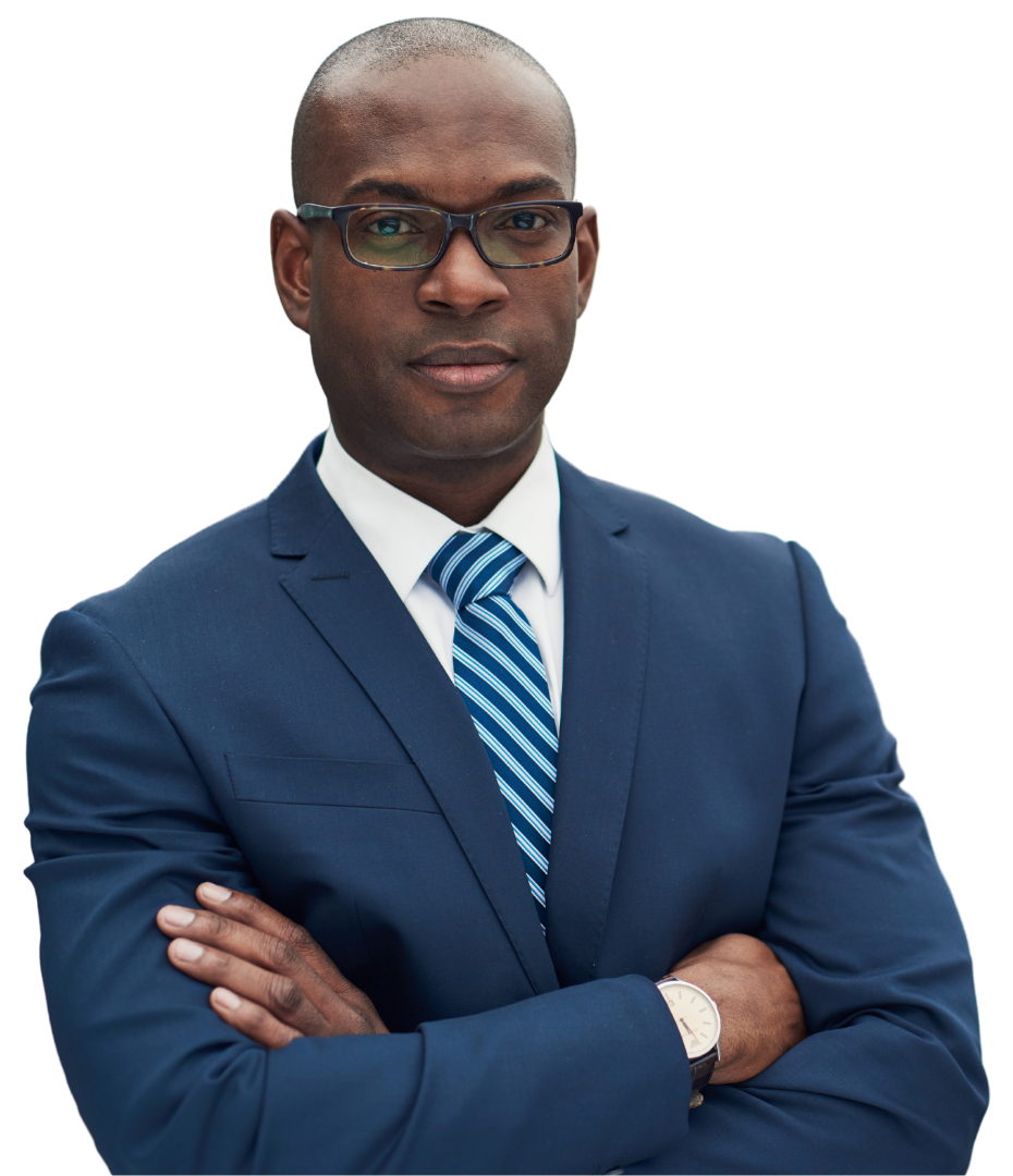 A man in a suit and tie with his arms crossed
