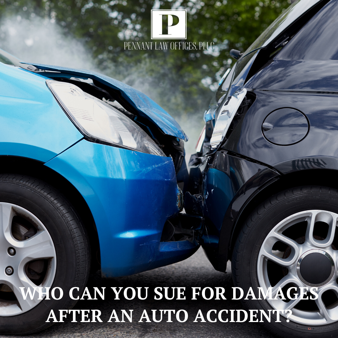 A blue car and a black car are involved in an auto accident.