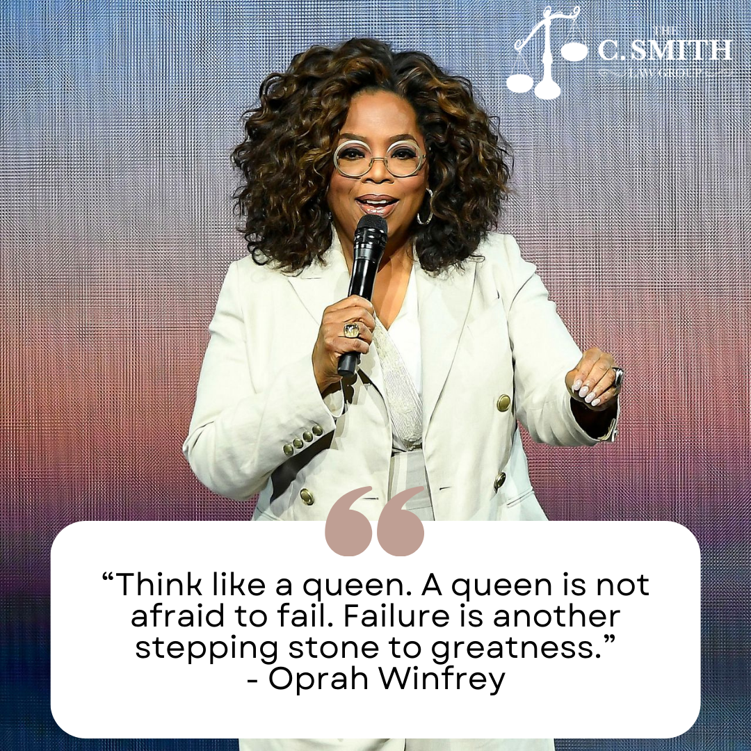 Oprah winfrey is holding a microphone and giving a speech.
