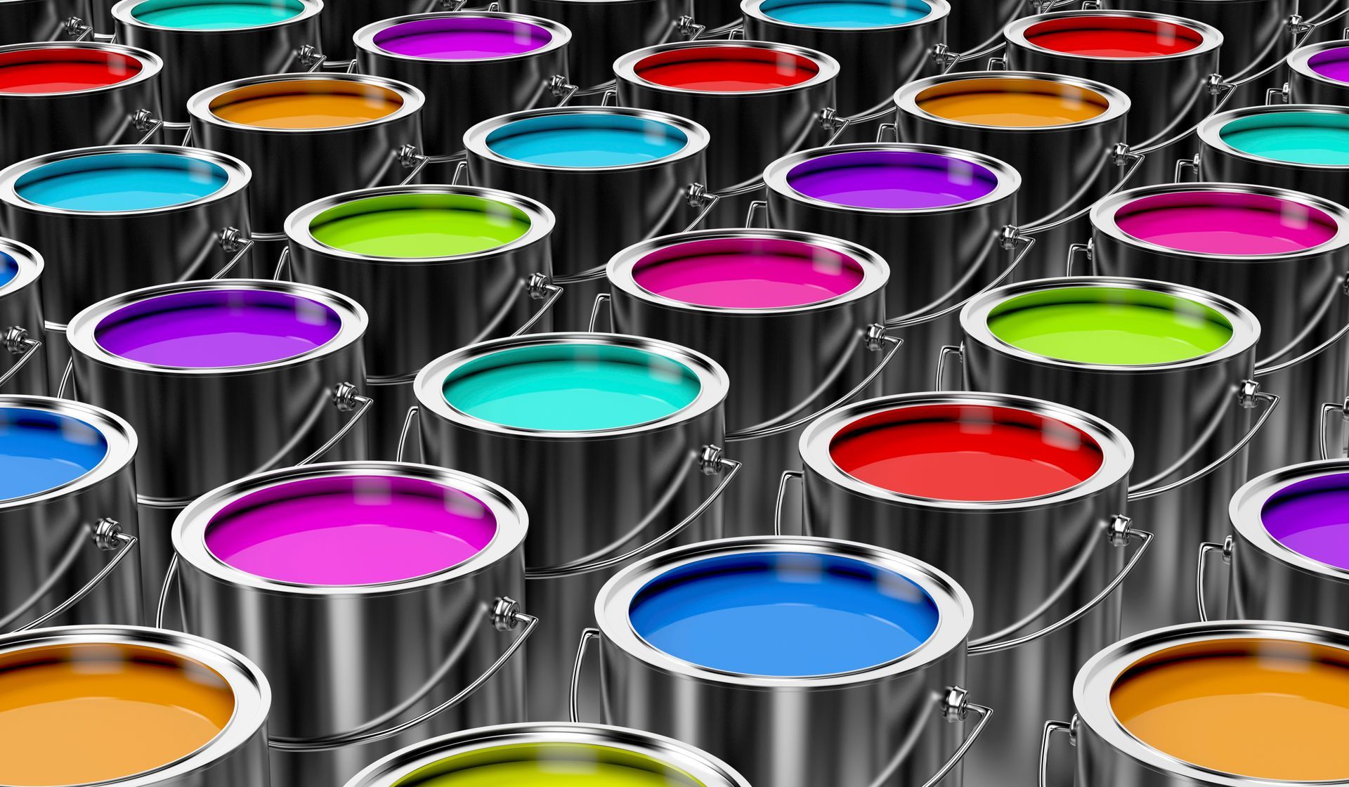 Open paint cans filled with a variety of bright colors.