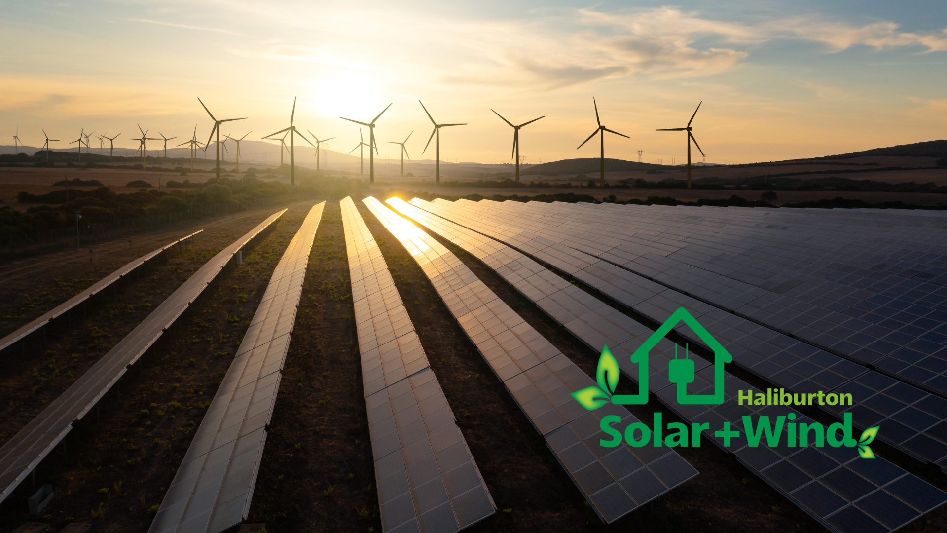 An aerial view of a solar and wind farm