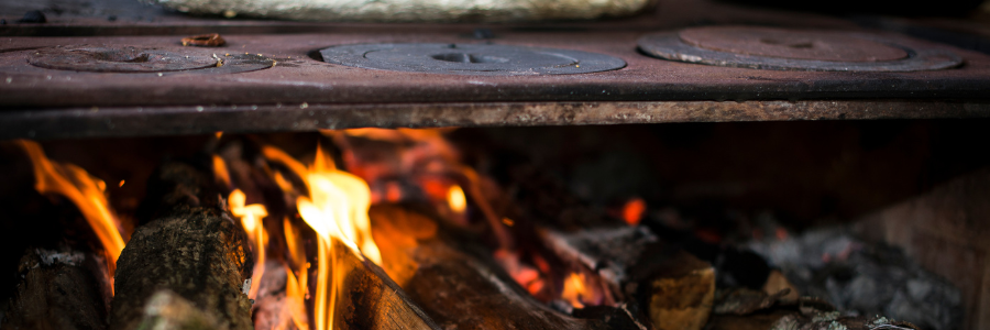 A close up of a fire in a fireplace.