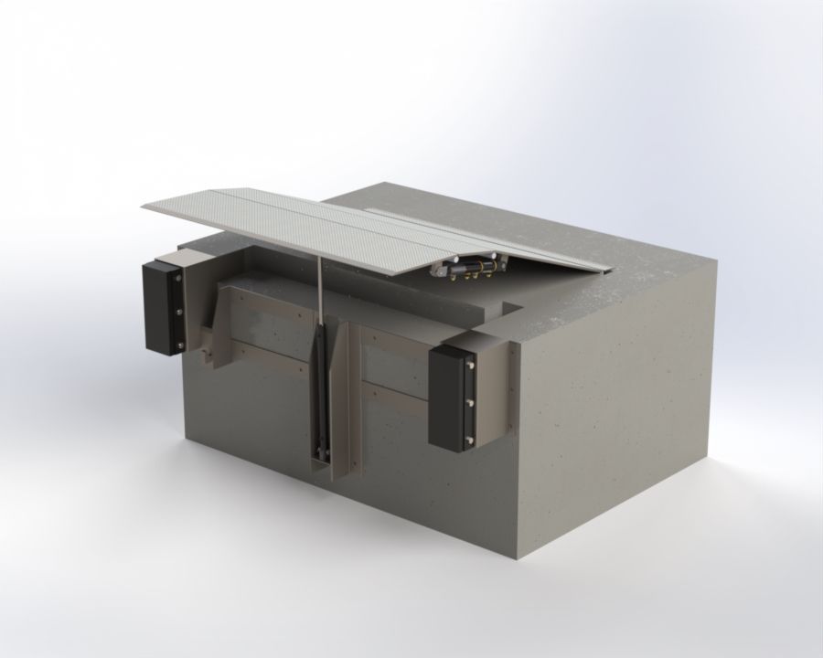 Quai de chargement avec rampe déployable. Structure grise et cubique, munie de deux butoirs noirs. La rampe est levée, suspendue par un câble.