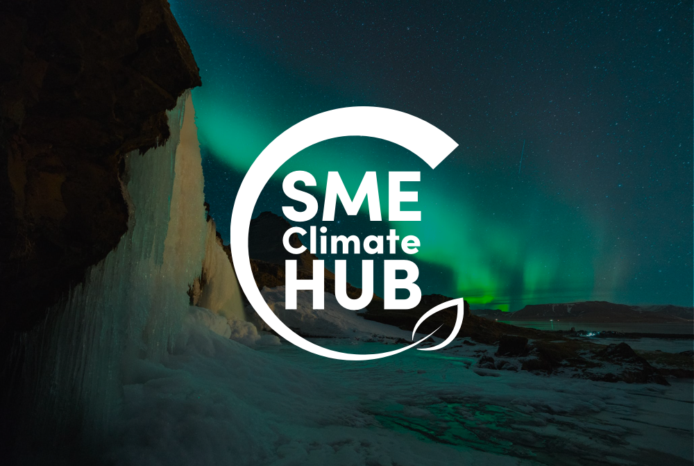A logo for sme climate hub with a picture of the aurora borealis in the background.
