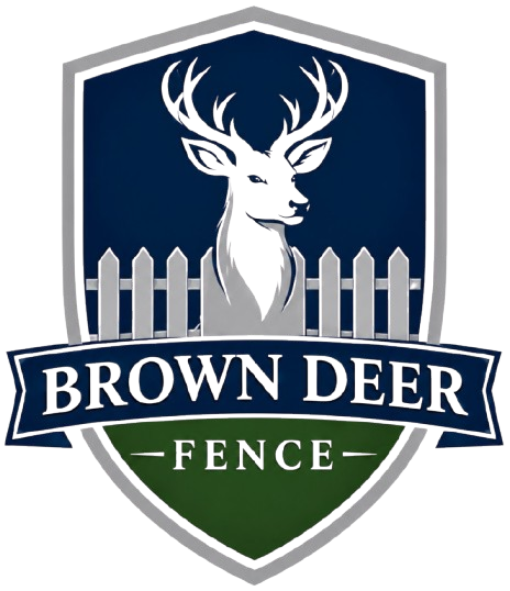 Brown Deer Fence Logo with Shield Emblem, Deer Head Graphic, White Picket Fence, and Company Name in Brown Deer, WI