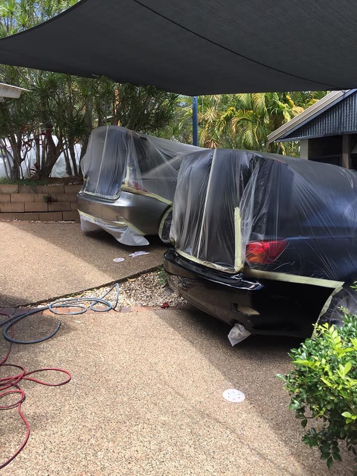 paint repairs on black vehicle