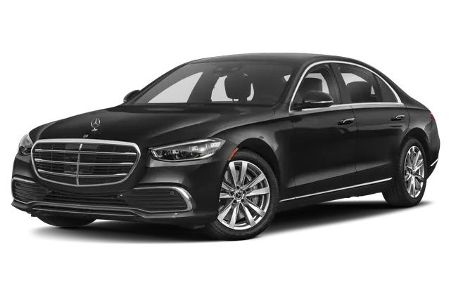 A black mercedes benz e class sedan is shown on a white background.