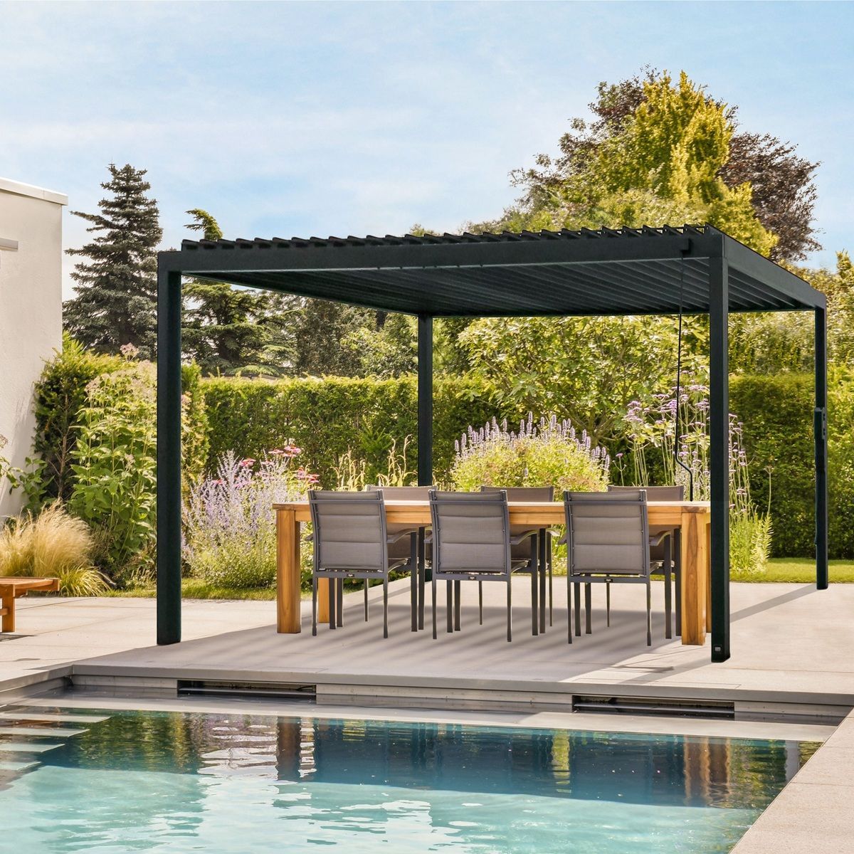 Modern black pergola over a patio dining set beside a swimming pool in a landscaped backyard
