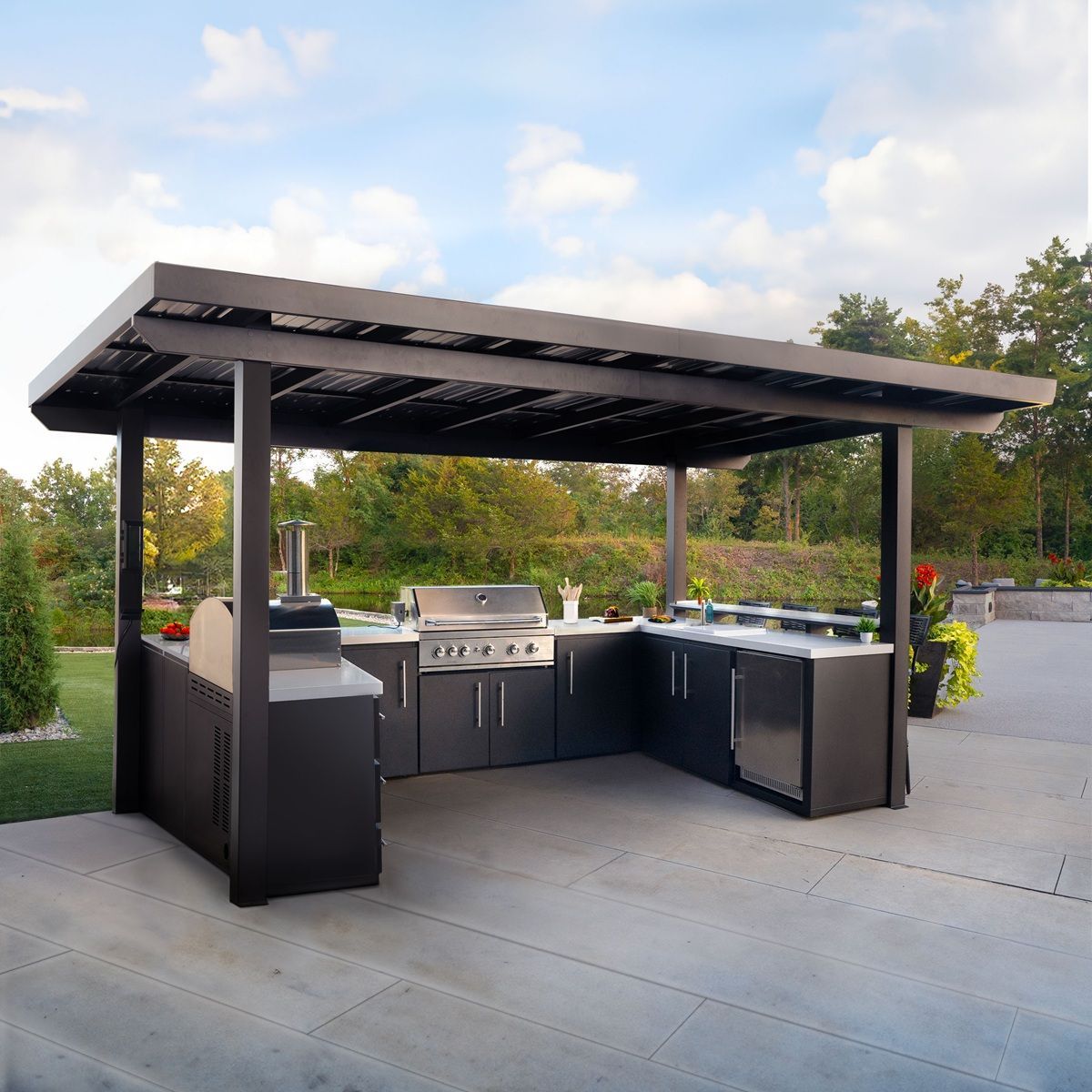 Outdoor black barbecue pavilion with built-in grills on a concrete patio